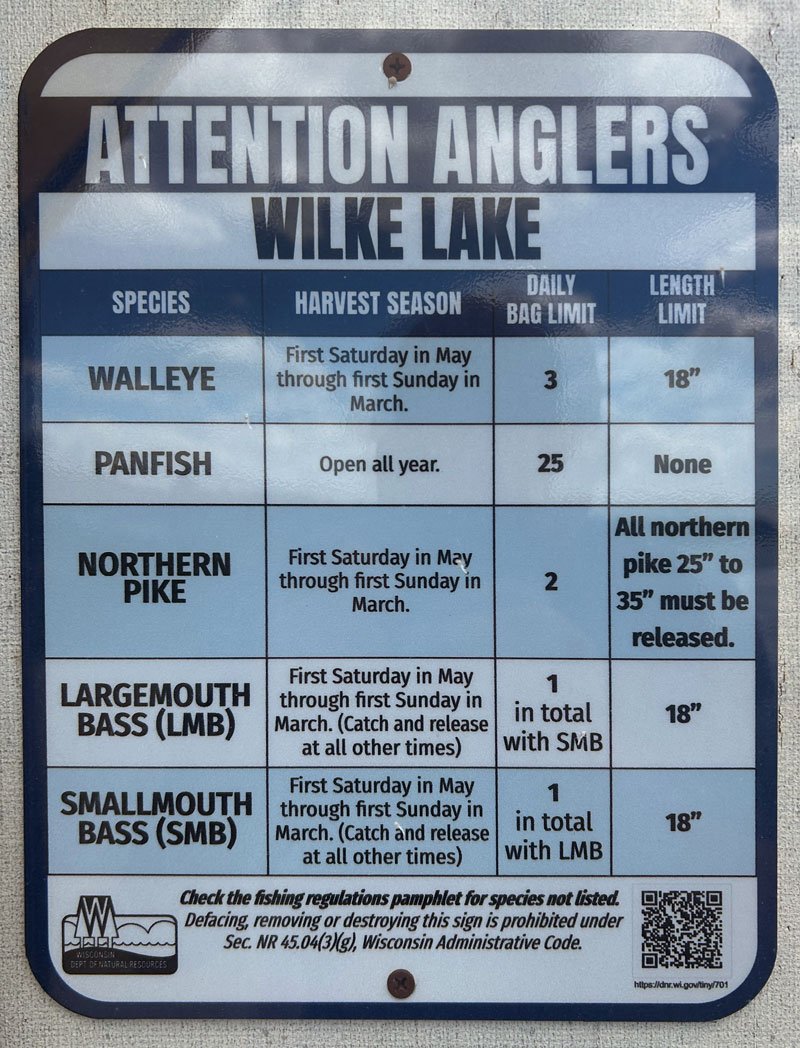 Fishing regulations sign that is posted at the lake. Sign contents appear in text below.